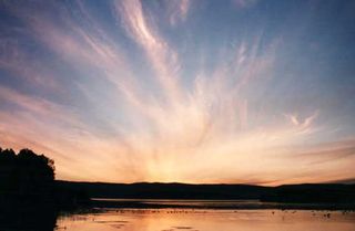 Cirrus clouds are made of ice particles and can cover 30% of Earth's atmosphere.