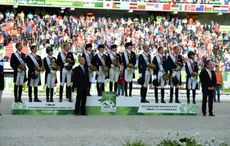 The British, German and Dutch teams on the podium at the 2014 World Dressage Championships, then part of the World Equestrian Games