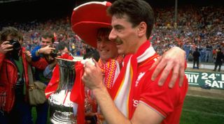 May 1986: Kenny Dalglish (left) and Ian Rush of Liverpool pose with the trophy after the FA Cup final against Everton at Wembley Stadium in England. Liverpool won the match 3-1. \ Mandatory Credit: David Cannon/Allsport