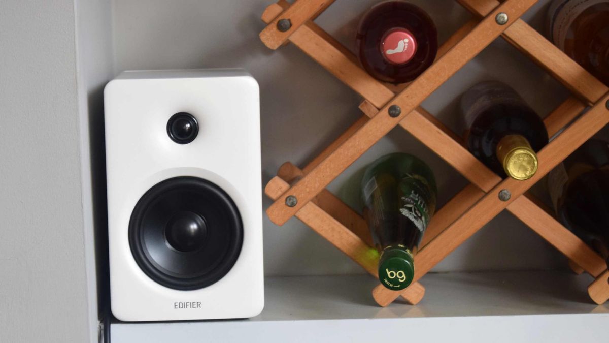 The secondary Edifier M90 unit, next to some bottles.