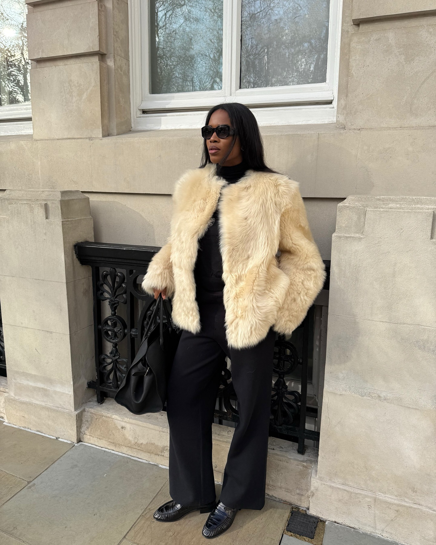 @nlmarilyn wearing a faux-fur coat.