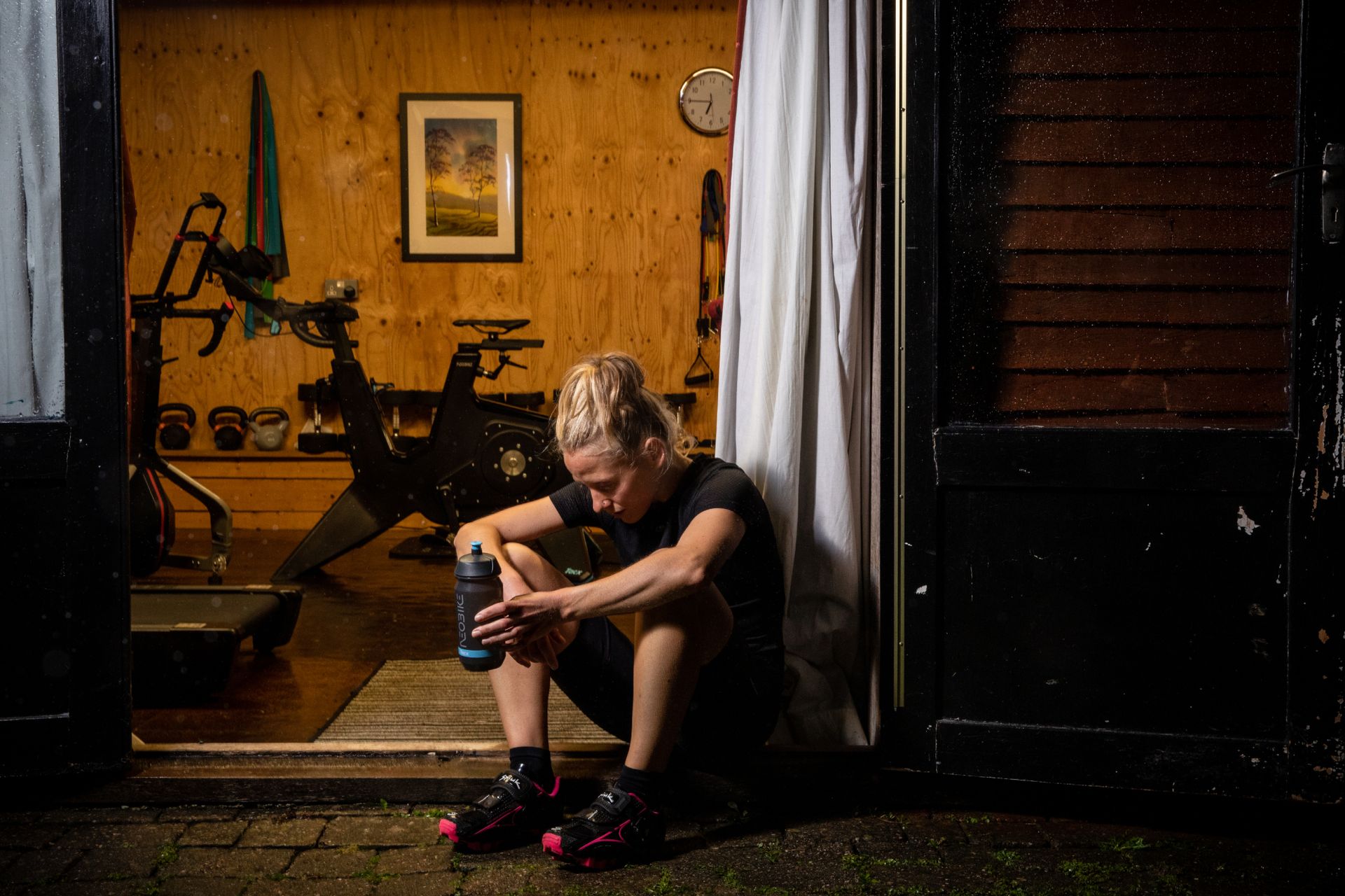Image shows a female rider training on the bike