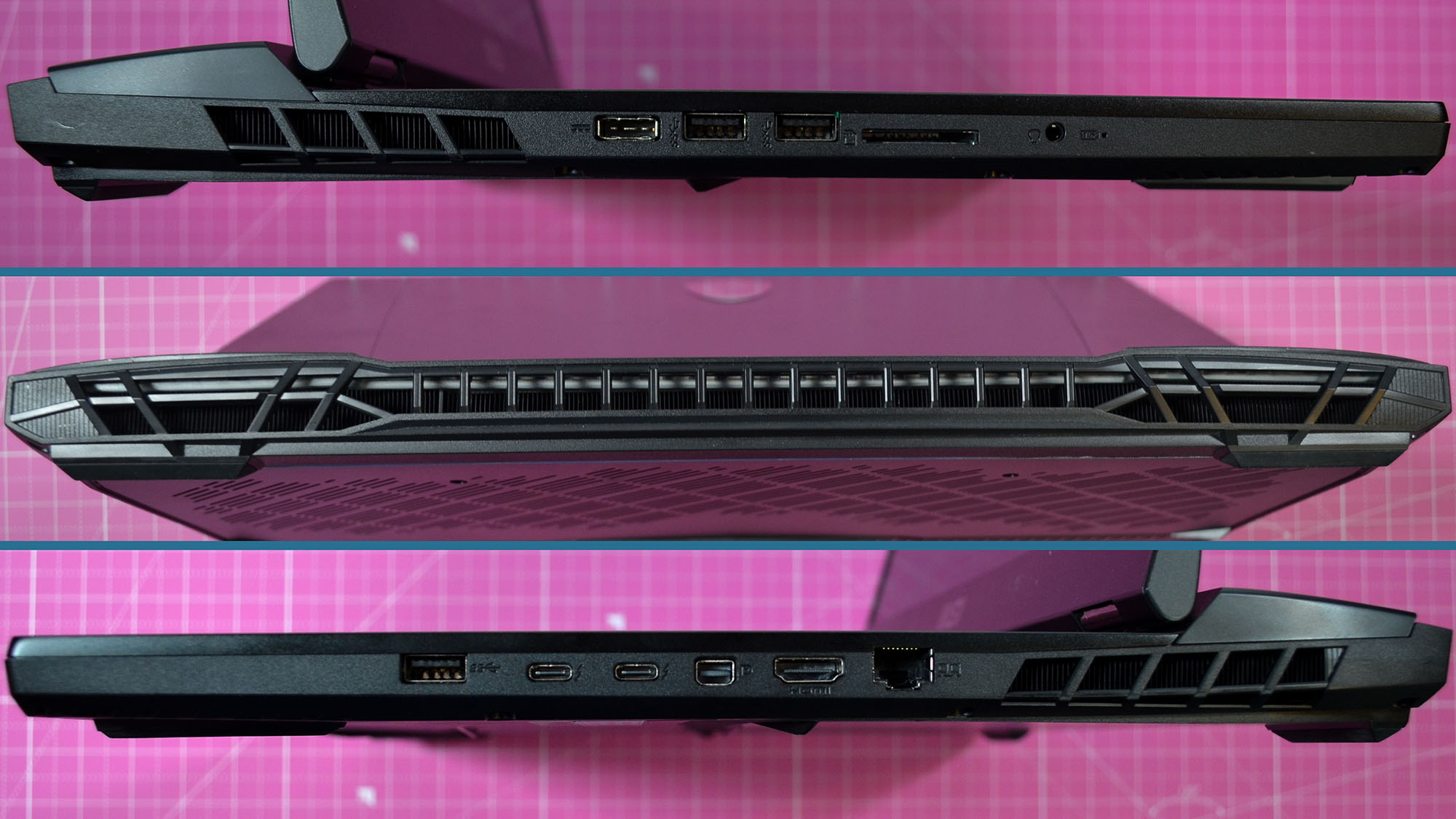 An MSI GT77 Titan on a pink desktop mat