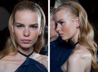 Model hair pulled back tightly and created a beautifully wavy finish