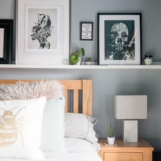 bedroom with photo frame and table lamp