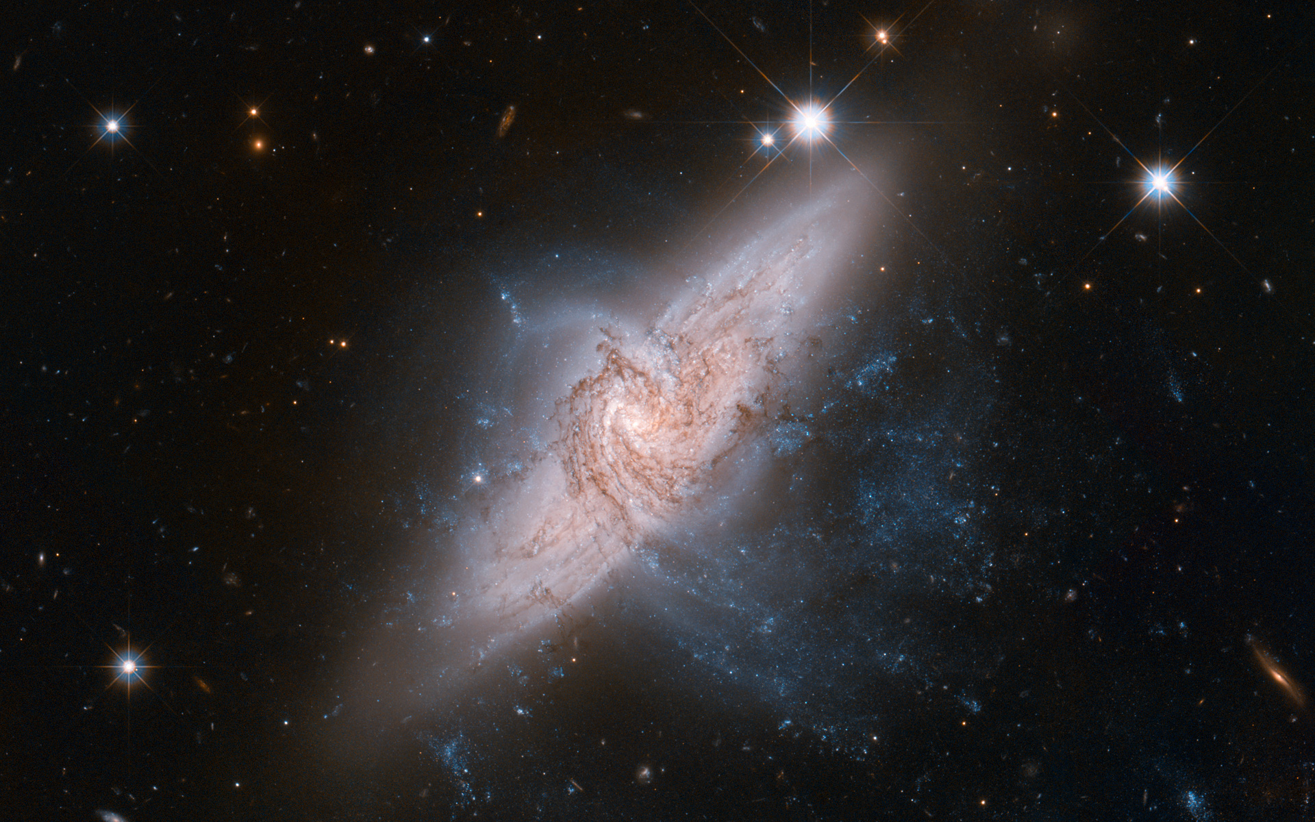 Hubble view of NGC 3314 space wallpaper