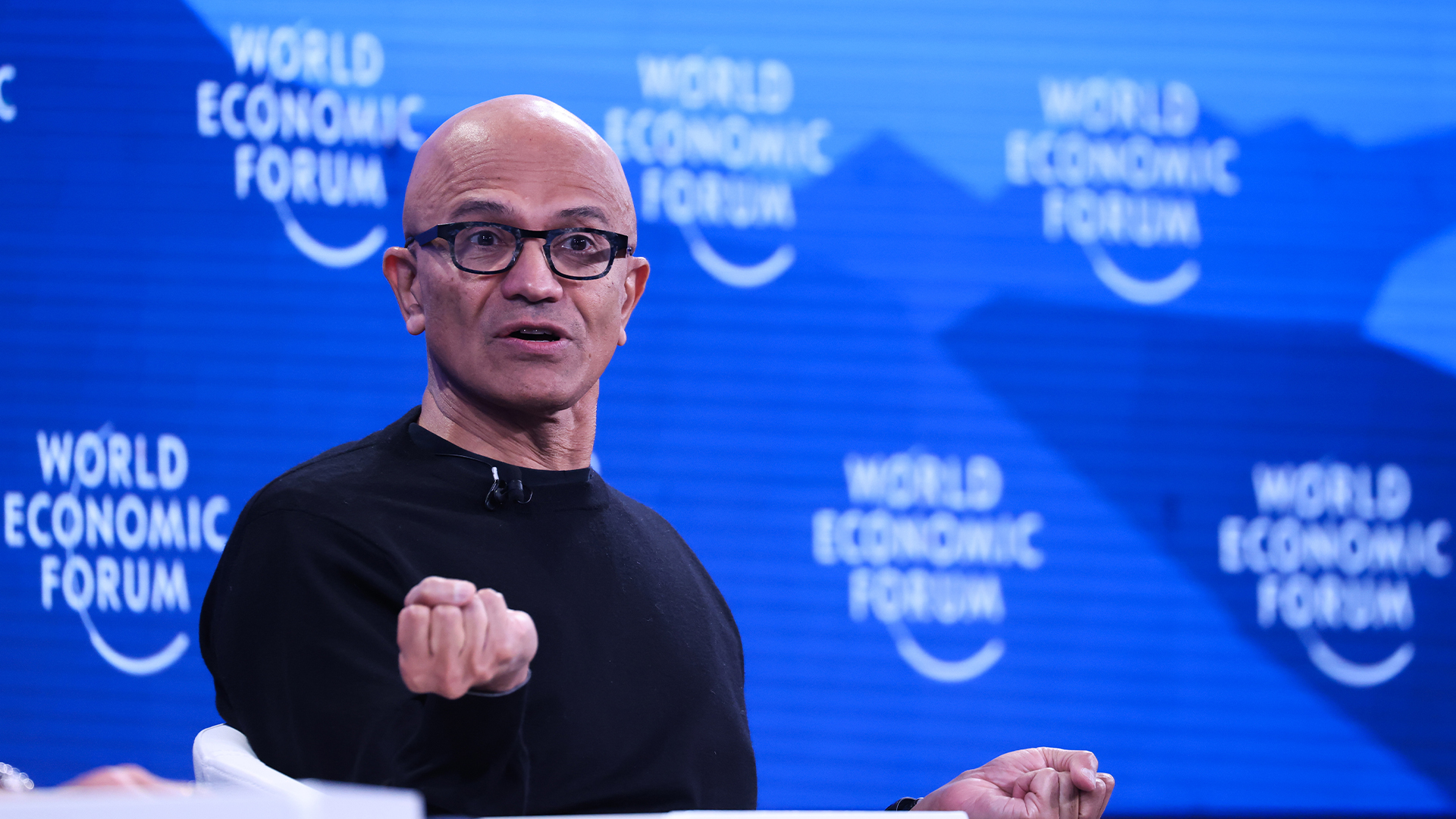 Microsoft CEO Satya Nadella pictured speaking during an interview with BlackRock CEO Larry Fink at the 2026 World Economic Forum (WEF) in Davos, Switzerland. 