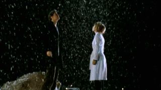 Sarah Michelle Gellar and David Boreanaz looking at the snow in Buffy the Vampire Slayer.