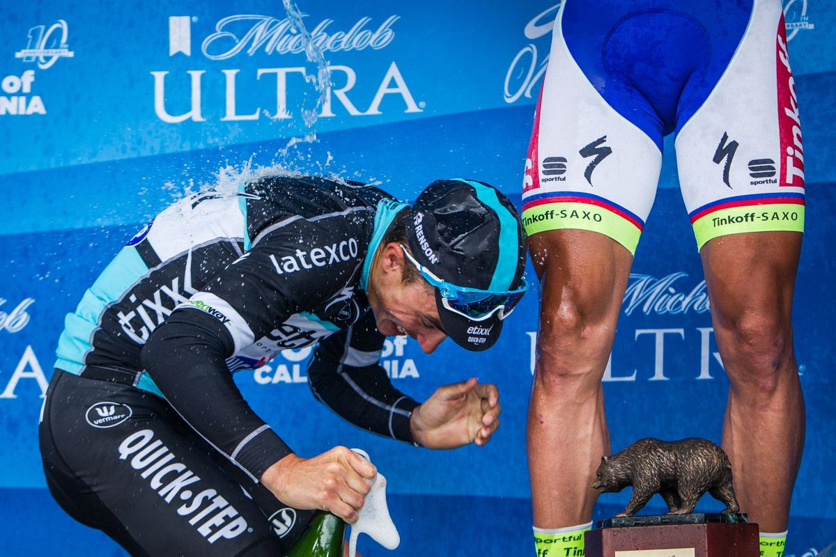 Julian Alaphilippe (Etixx-Quick Step) gets soaked with champagne on the podium