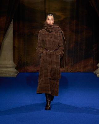 A model walks in the Burberry fall/winter 2025 runway show during London Fashion Week.