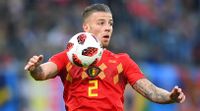 Toby Alderweireld chest controlling the ball.