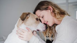 Loving dog and owner