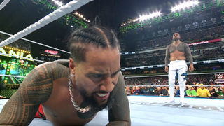 jimmy and jey uso during their match against each other