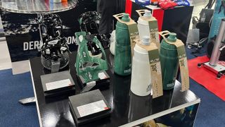iceBike 2023 display of Elite Jet bottles and Cannibal XC and Prism cages