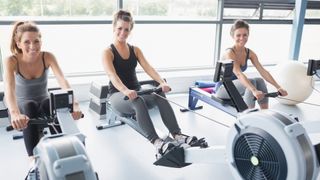 How to use a rowing machine: image shows people using rowing machines