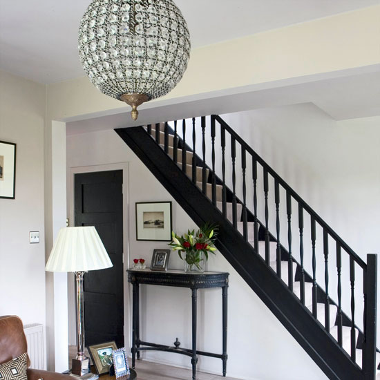 living room with chandelier