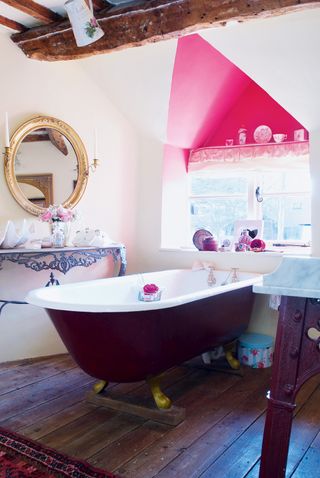 freestanding bath in pink bathroom