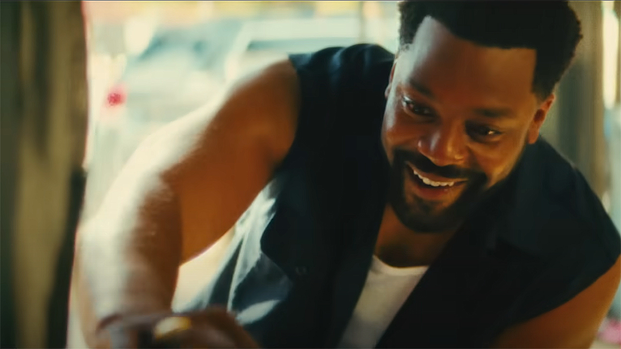 Gary ruffling an off-camera Riri's hair in Marvel's Ironheart TV show