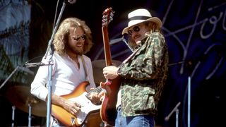 The Eagles' Don Felder (left) and Joe Walsh exchange licks onstage in 1977