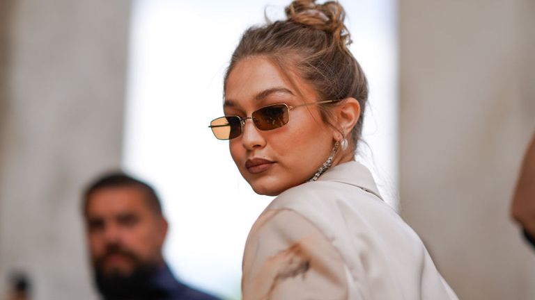 Gigi Hadid wears sunglasses, earrings, outside Heron Preston, during Paris Fashion Week - Menswear Spring/Summer 2020, on June 18, 2019 in Paris, France.