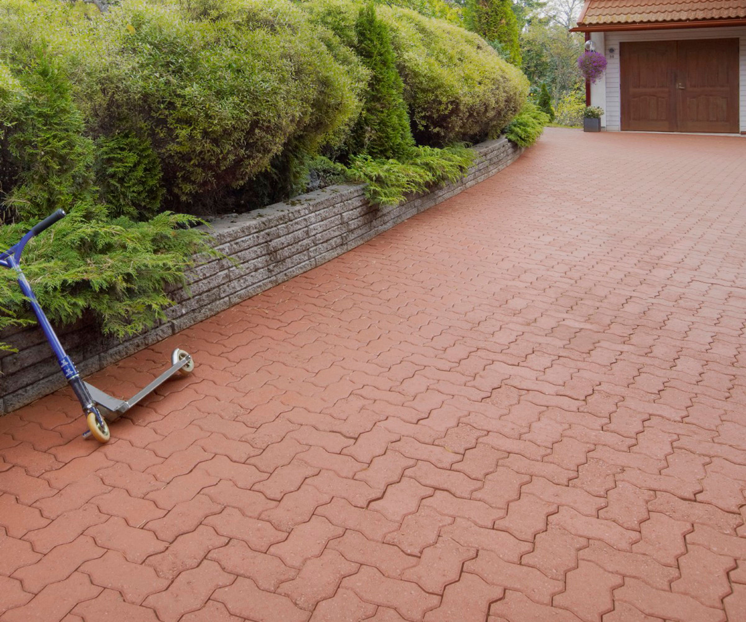 red permeable block paving on driveway