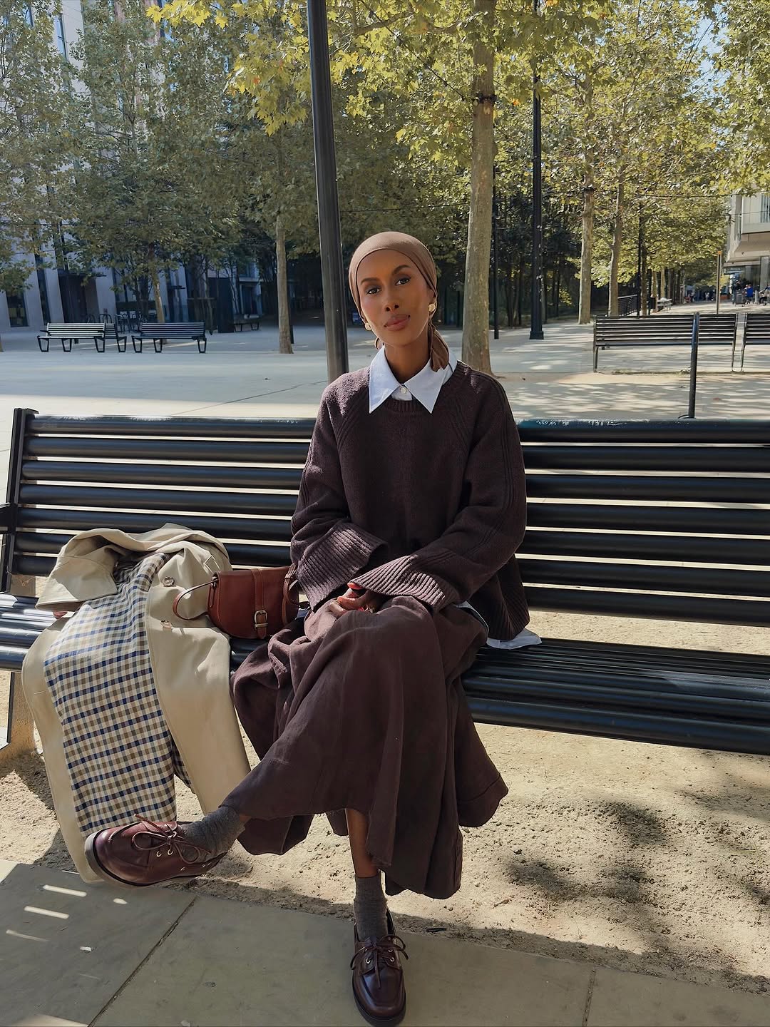 woman wearing winter sweater trend 2025