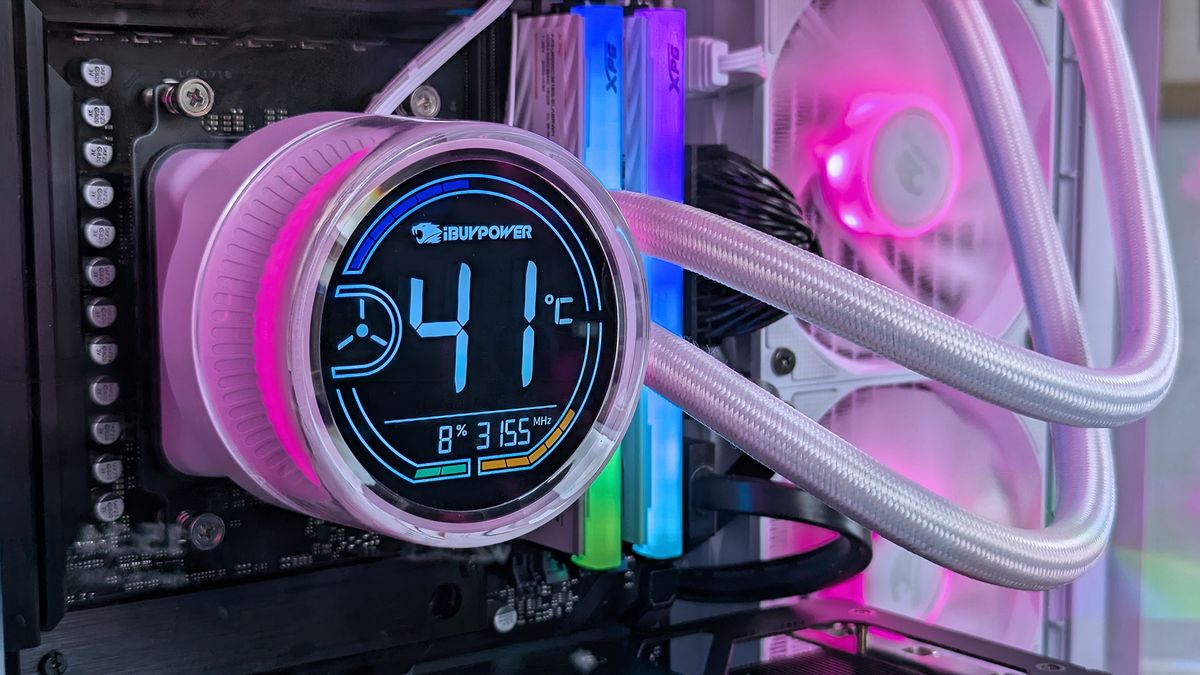 Close-up of iBUYPOWER RDY Trace X R01 pre-built gaming PC's internal cooling system with a digital display reading 41&deg;C. Radiant lighting and sleek cables exude a high-tech, vibrant ambiance.