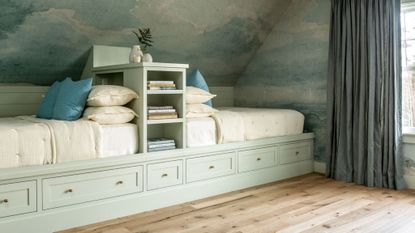 Bedroom with built-in bed with storage