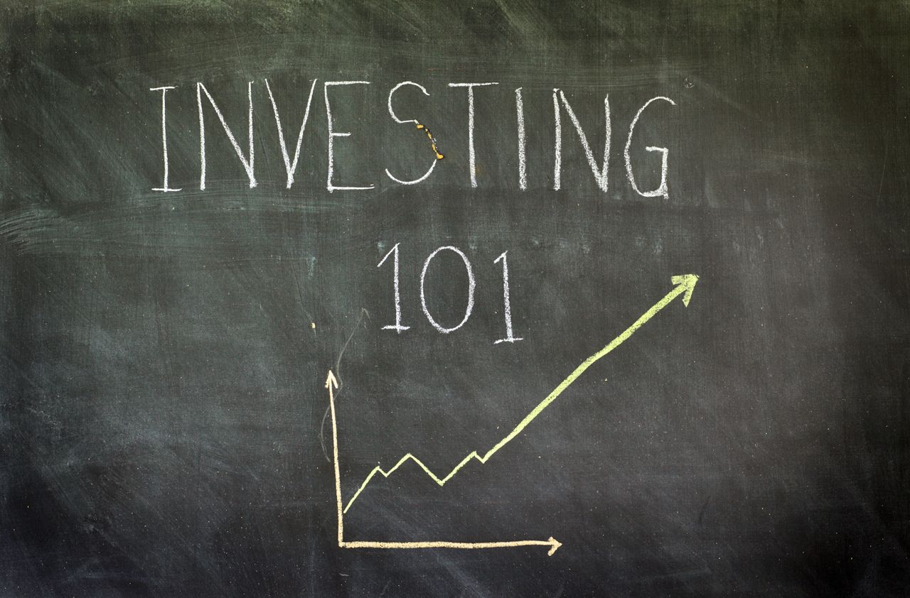 &amp;quot;Investing 101&amp;quot; written in chalk on blackboard.