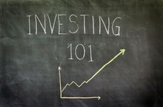 "Investing 101" written in chalk on blackboard.