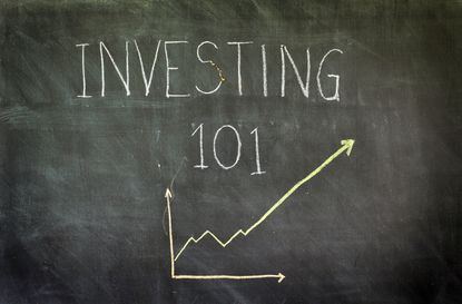 "Investing 101" written in chalk on blackboard.