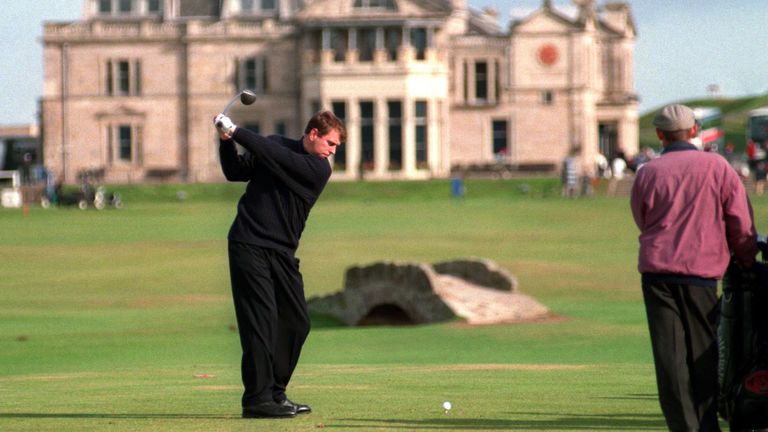 Prince Andrew hits a golf shot at St Andrews