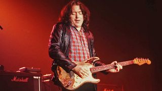 Rory Gallagher performs with his 1961 Fender Stratocaster circa 1989