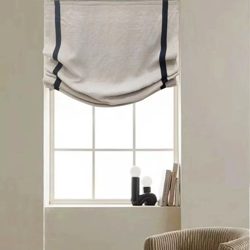 neutral Roman blinds with black stripe