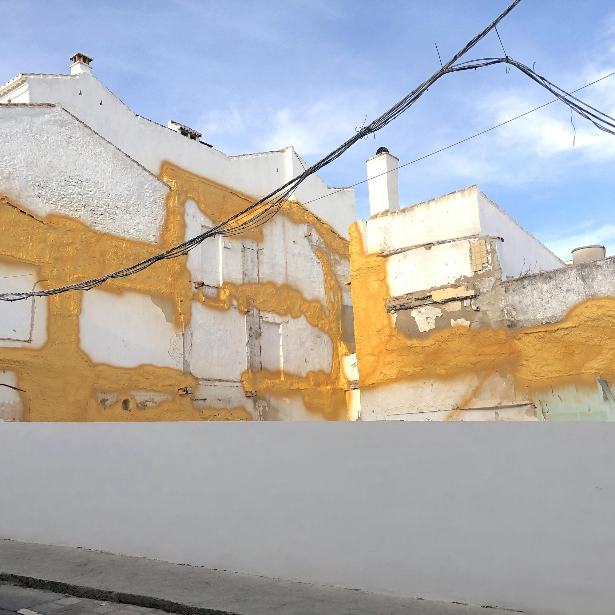 building with yellow spray foam insulation