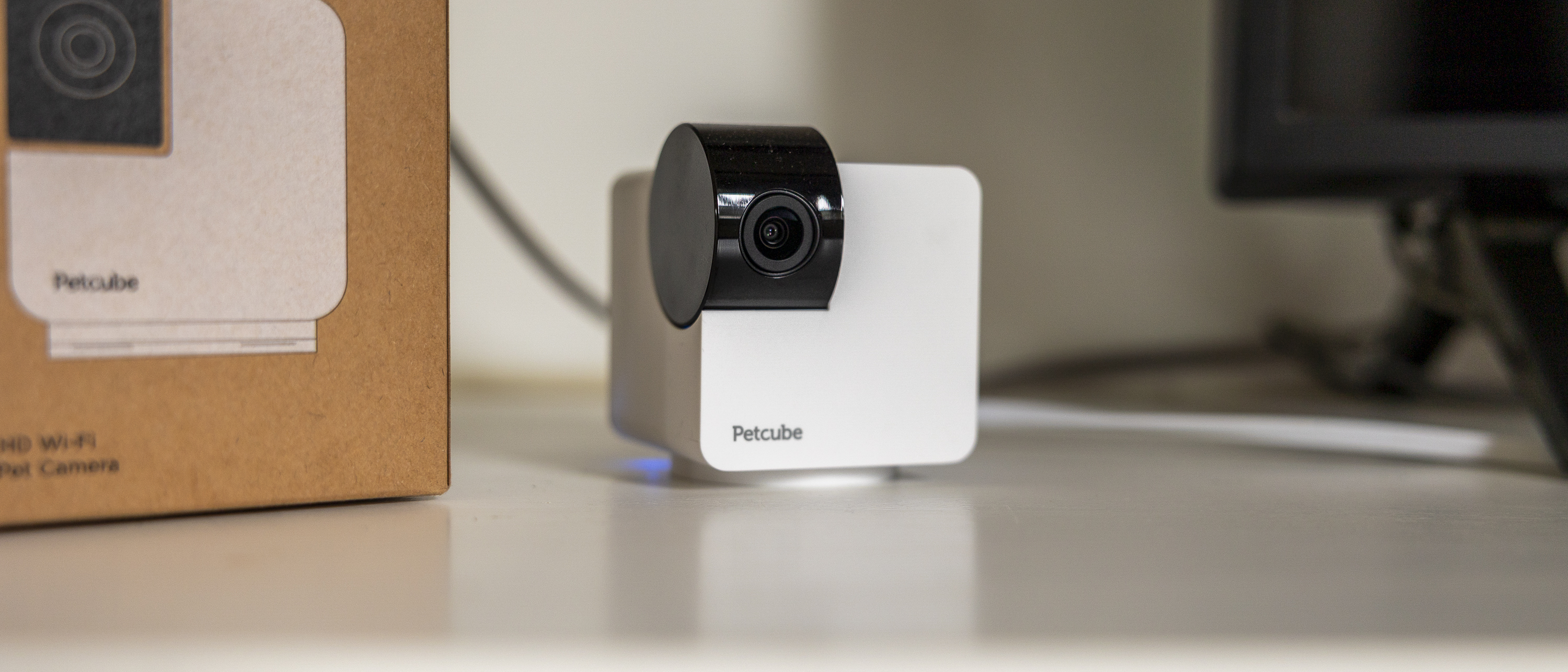 The Petcube Cam 360 in a white living room