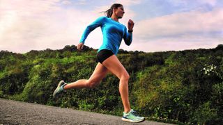 Woman running wearing Garmin Forerunner 745 watch