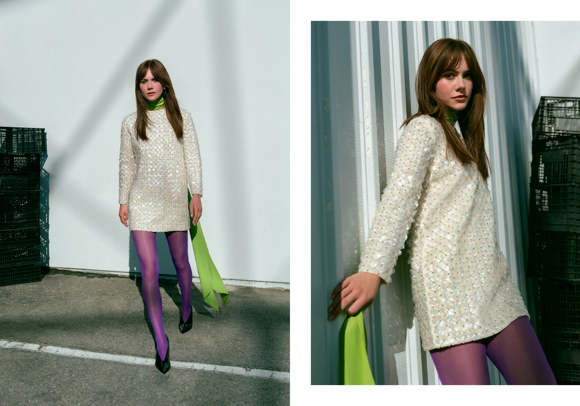 Emilia Jones for WWW's fall Ones to Watch portfolio. She is standing outside next to a stack of black crates wearing a white beaded minidress with a green neck scarf and purple tights.