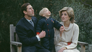 Diana, Princess of Wales (1961 - 1997) and Prince Charles with their son Prince William during a photocall at Kensington Palace in London, 14th December 1983