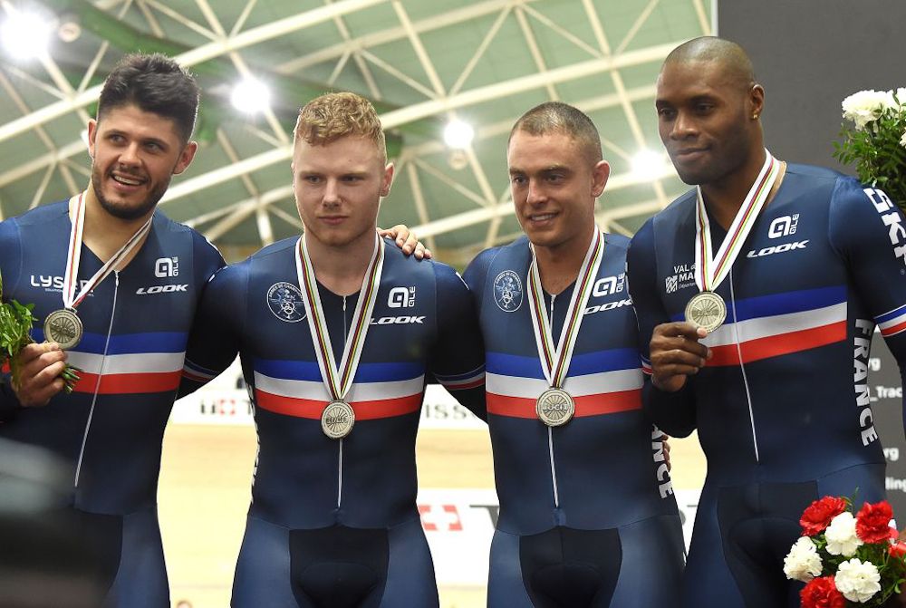 French team Gregory Bauge, Quentin Lafargue, Sebastien Vigier and Michael D'Almeida react at the podium after winning silver in the men's team sprint