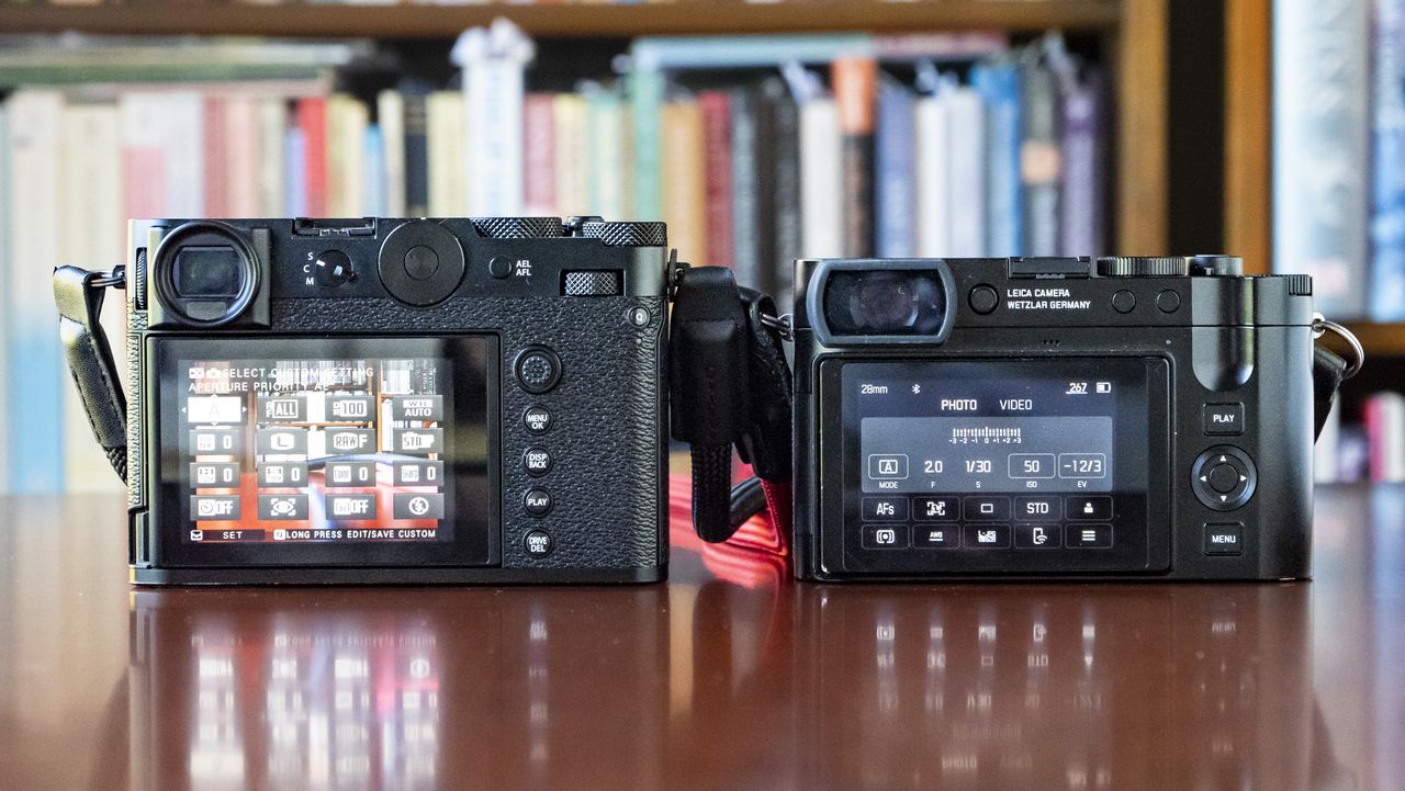 Fujifilm GFX100 RF alongside Leica Q3, rear screens