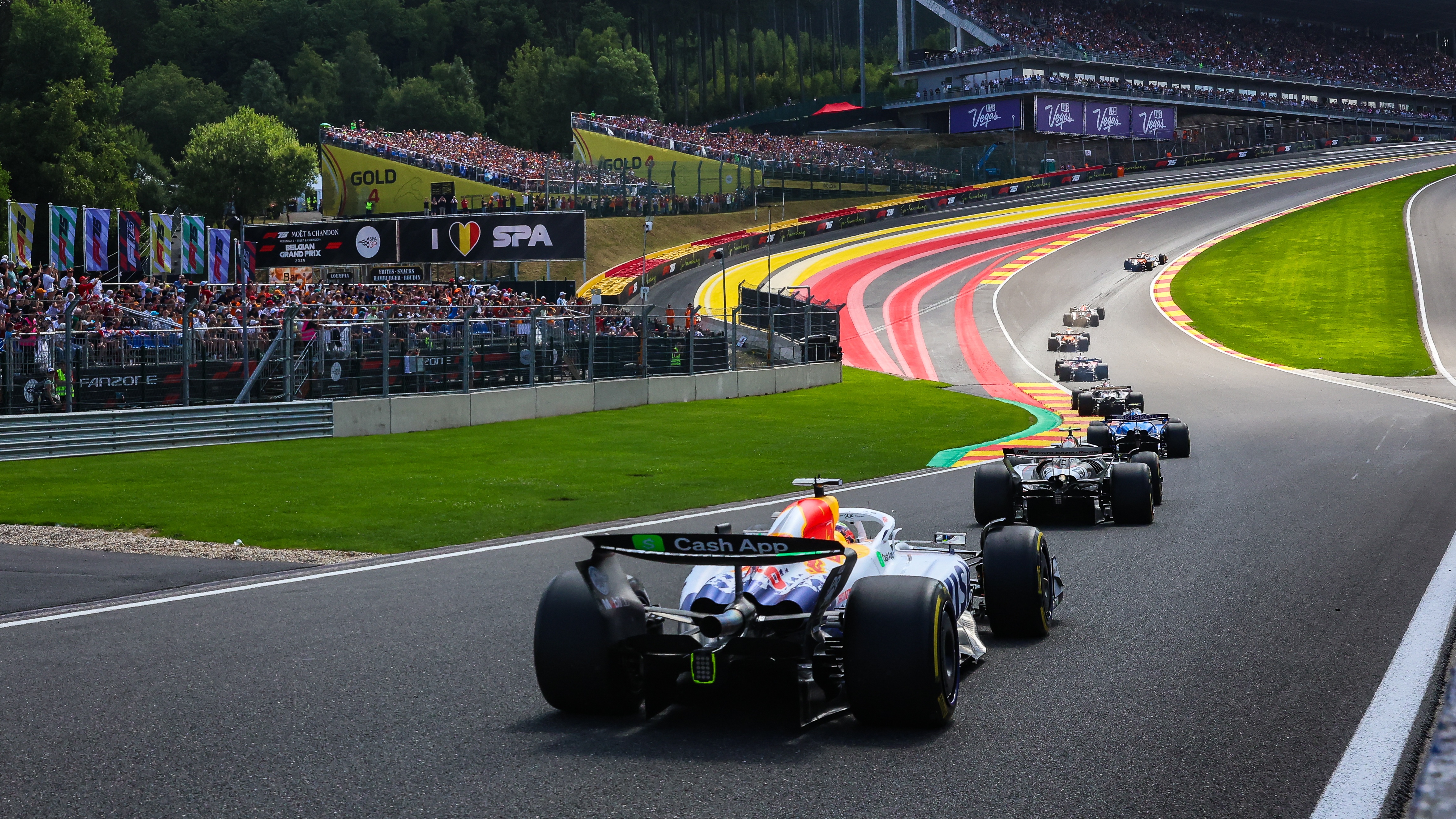 Isack Hadjar of France driving the (6) VCARB 02 on track follows the pack into Eau Rouge and Raidillon during the Sprint ahead of the F1 Grand Prix of Belgium at Circuit de Spa-Francorchamps