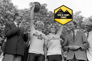 Tour de France winners Frenchman Laurent Fignon and Marianne Martin of the United States smile on the podium on July 22, 1984 in Paris