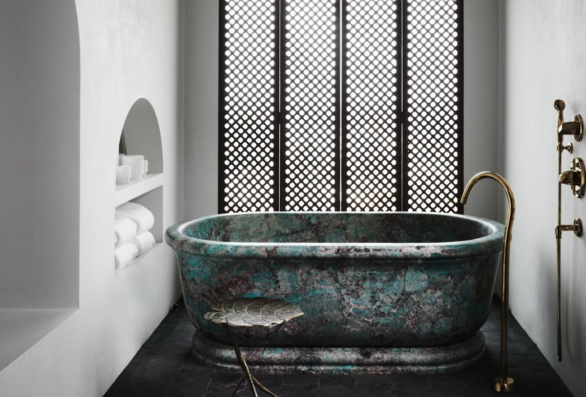 A new take on the natural bathroom trend is emerging, and it's about more than filling your space with plants