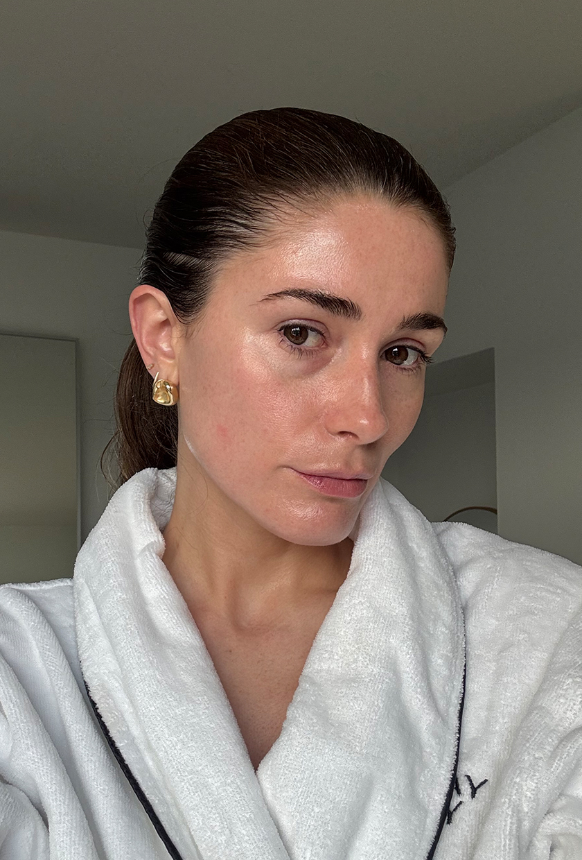 A selfie of Eleanor in dressing gown after using using Medik8 Advanced Peptide serum