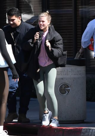 Sofia Richie is spotted on a rare outing in Los Angeles. Richie stepped out on a blustery day wearing a black puffer jacket, green leggings, and trainers on Feb. 2.