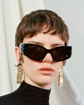 Pre Fall 2024 Best Looks Fashion Shoot featuring close-up of woman in black sunglasses