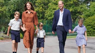 Prince George, Catherine, Princess of Wales, Prince Louis, Prince William and Princess Charlotte arrive for a settling in afternoon at Lambrook School in 2022