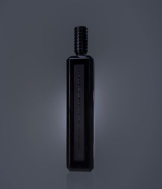 Serge lutens boreno 1883 perfume in black bottle against grey background