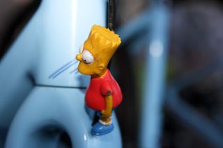 Bart Simpson looks forward to a bath after a dizzying time aboard new 2019 elite men's US cyclo-cross champion Gage Hecht's bike